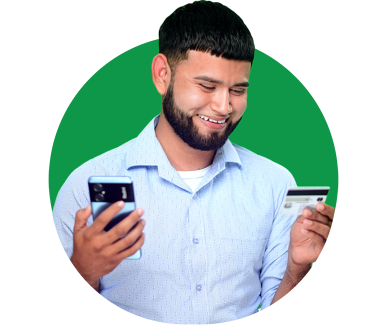 Man holding phone and credit card to make online payment