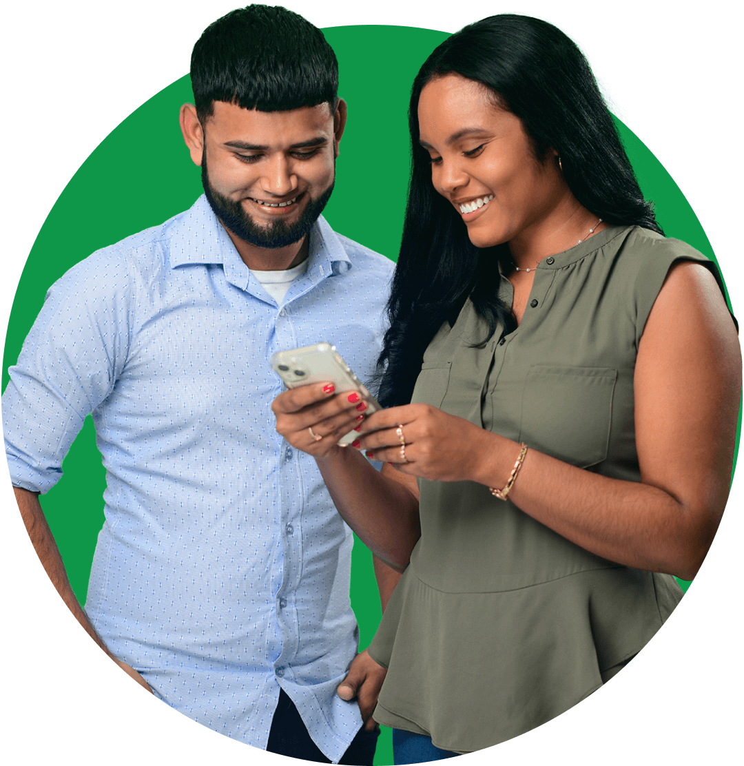 Man and woman looking at phone screen