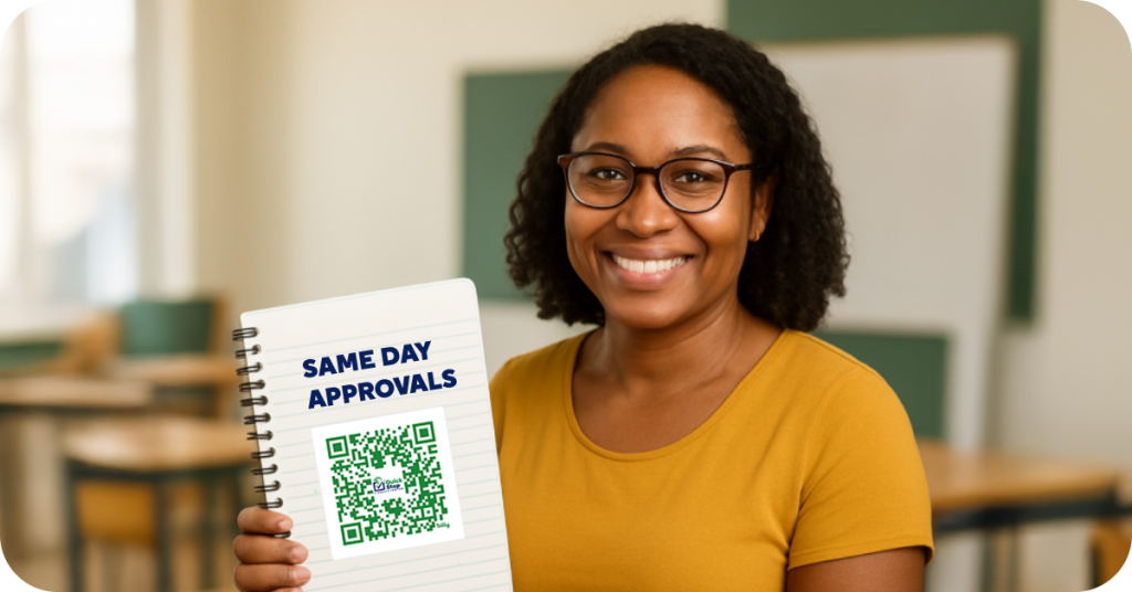 Woman holding note book with same day approvals written on it